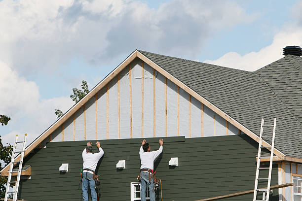 Professional Siding technician working in Burgess, VA